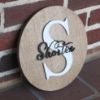 Picture of Personalized Round Raised Letter Family Name Sign